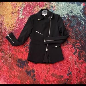 NWT. Never worn jacket with amazing zipper detail